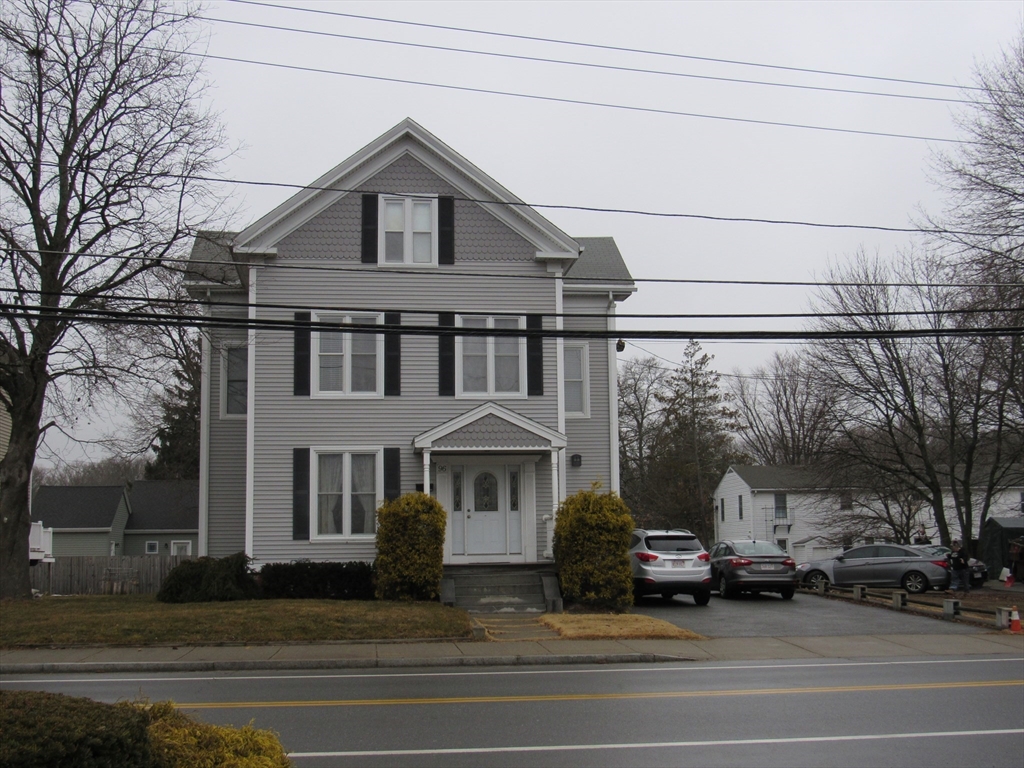 96 Main Street, Unit 1 Blackstone, MA 01504 - Photo 2 of 16 a view of a car in front of house