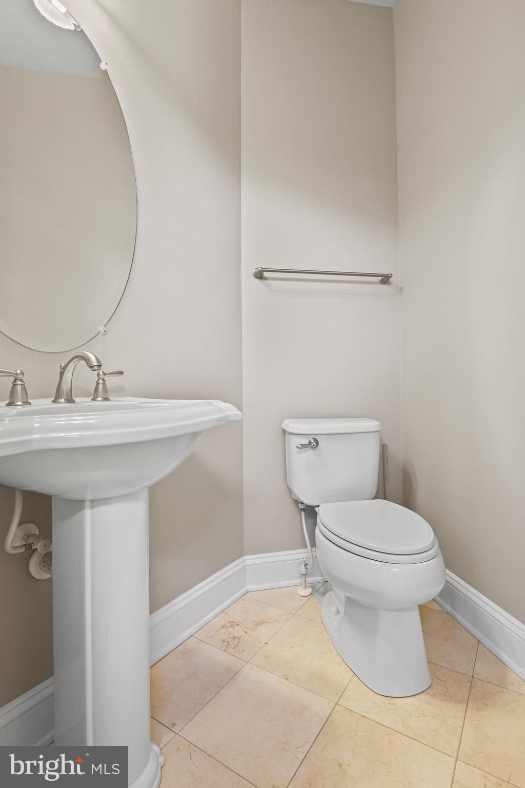 3553 Katherine Way Frederick, MD 21704 - Photo 19 of 34 a bathroom with a sink toilet and a mirror