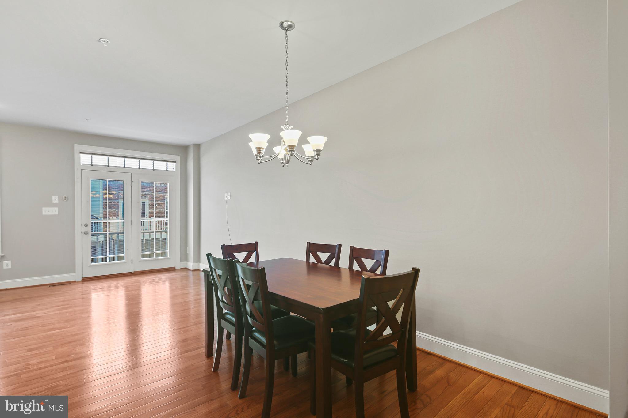 3553 Katherine Way Frederick, MD 21704 - Photo 27 of 34 a view of a dining room with furniture window and wooden floor