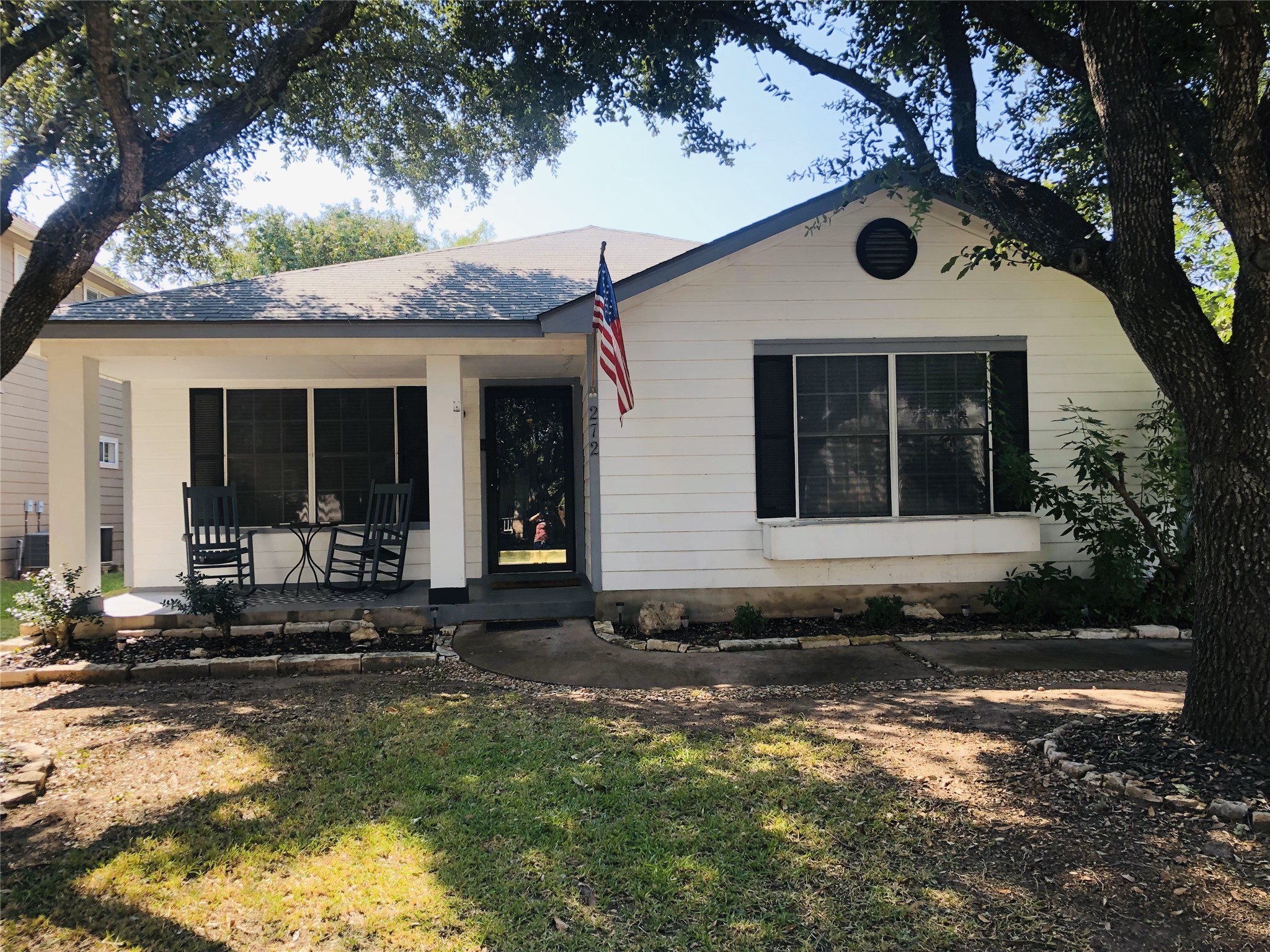 272 Tobin Drive Buda, TX 78610 - Photo 1 of 1 a front view of a house with a yard