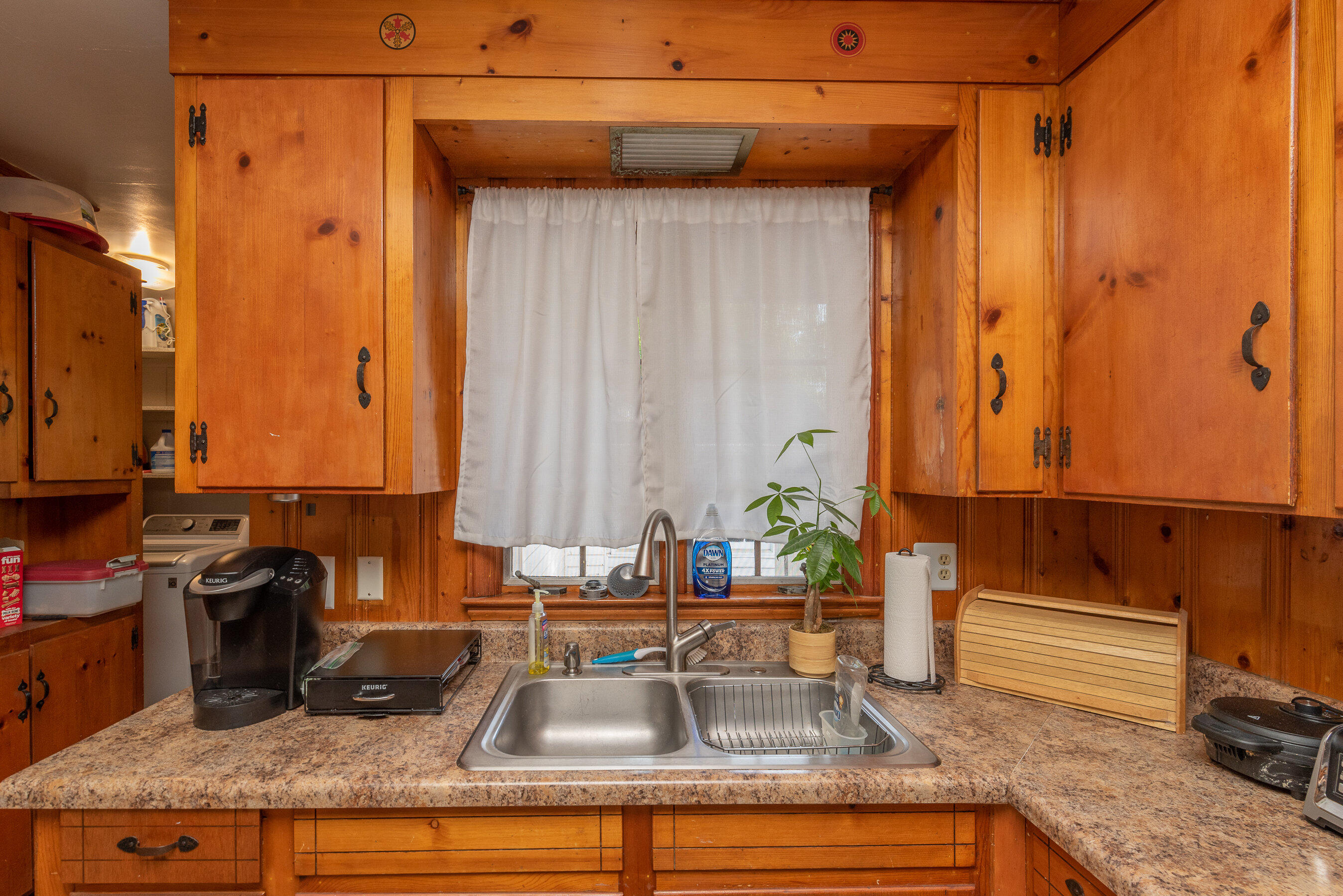 114 Gyles Road Southwest Aiken, SC 29803 - Photo 15 of 35 a kitchen with a sink and a window