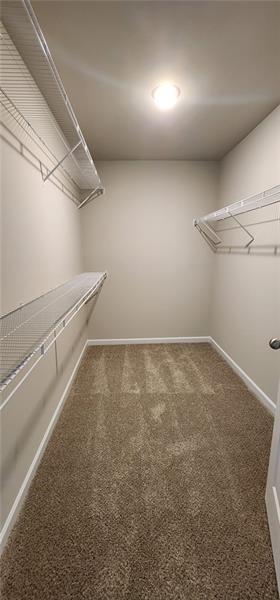 1476 Fern Ridge Lane Norcross, GA 30093 - Photo 15 of 19 a view of a room with racks on the wall