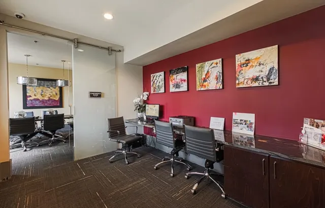 a living room with furniture fireplace and flat screen tv
