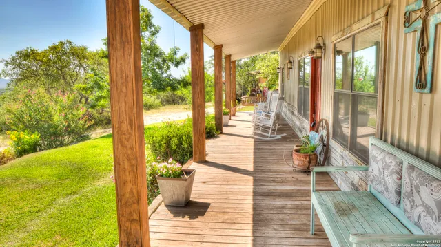 a view of balcony with patio