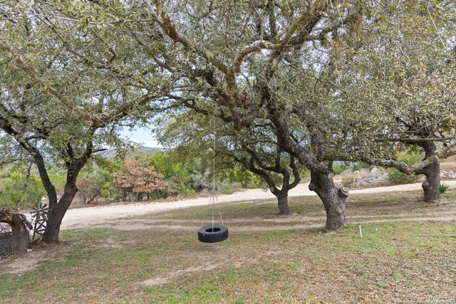 a view of swimming pool with a yard