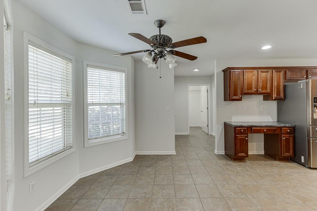 926 Red Wolf Court Dacula, GA 30019 - Photo 13 of 47 a view of an empty room with a window