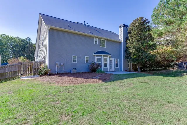 a house view with a outdoor space