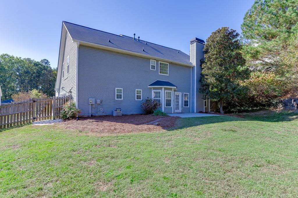 926 Red Wolf Court Dacula, GA 30019 - Photo 37 of 47 a house view with a outdoor space