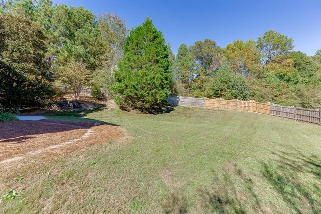 a view of an outdoor space and a yard