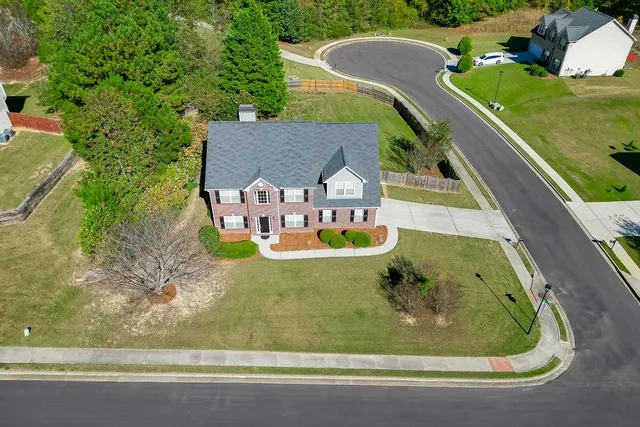 a view of swimming pool with a garden