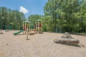 a view of a backyard with a slide
