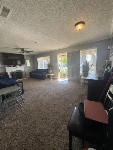 a workspace with furniture and window