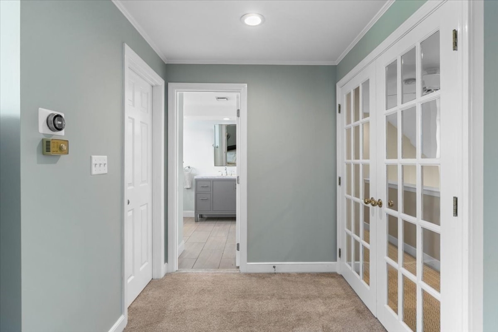 29 Ladds Way, Unit 29 Scituate, MA 02066 - Photo 21 of 33 a view of a bathroom with a bedroom
