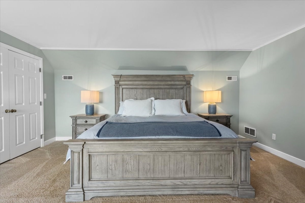 29 Ladds Way, Unit 29 Scituate, MA 02066 - Photo 23 of 33 a bedroom with a bed and window