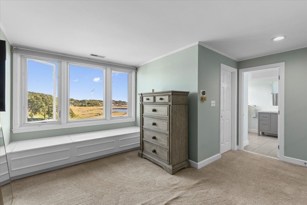 29 Ladds Way, Unit 29 Scituate, MA 02066 - Photo 25 of 33 a view of a livingroom with furniture and windows