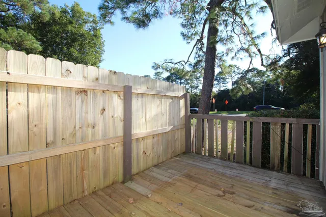 a view of a wooden fence