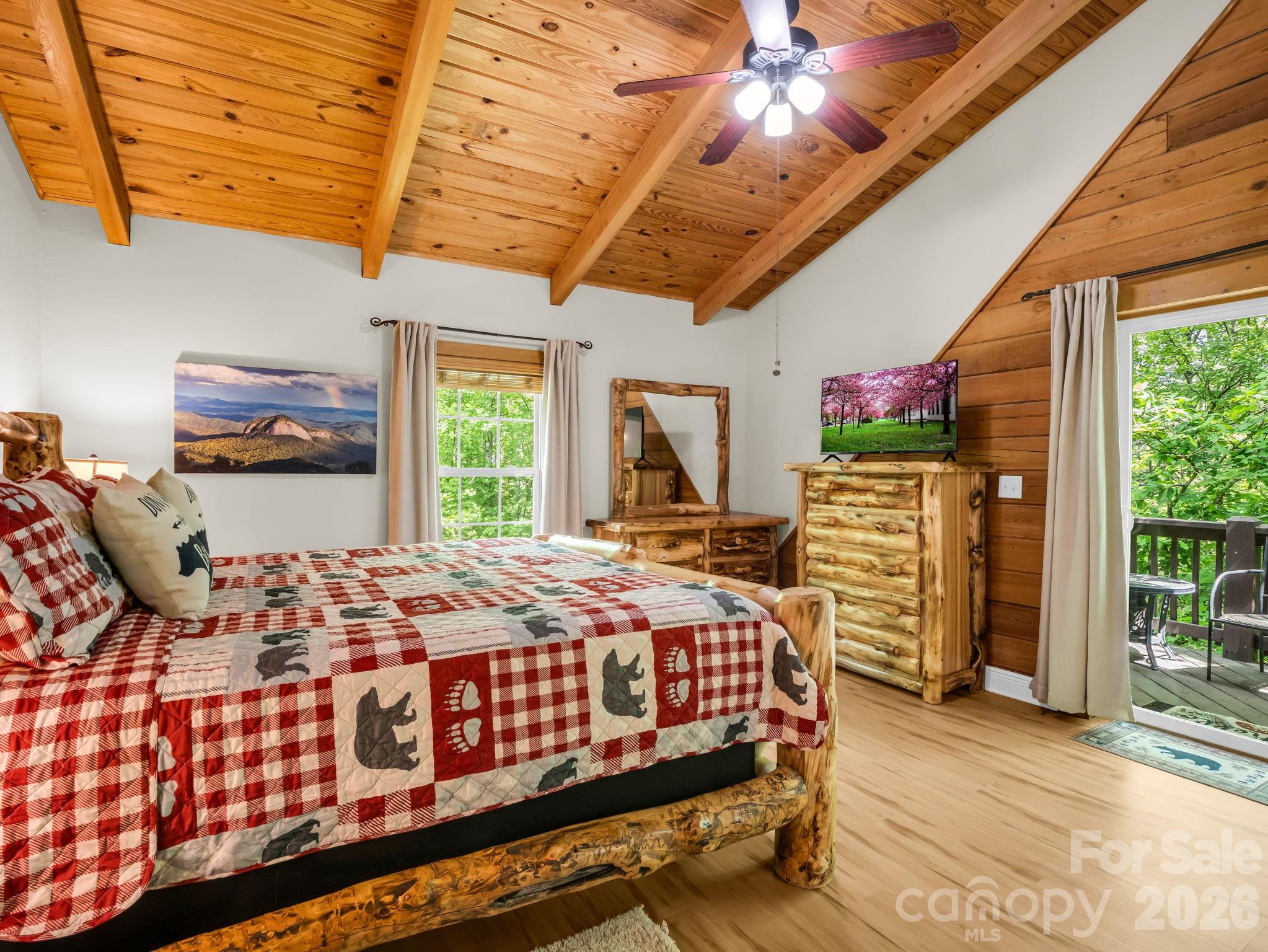 165 Dream Road Hendersonville, NC 28792 - Photo 32 of 46 a bedroom with bed and wooden floor