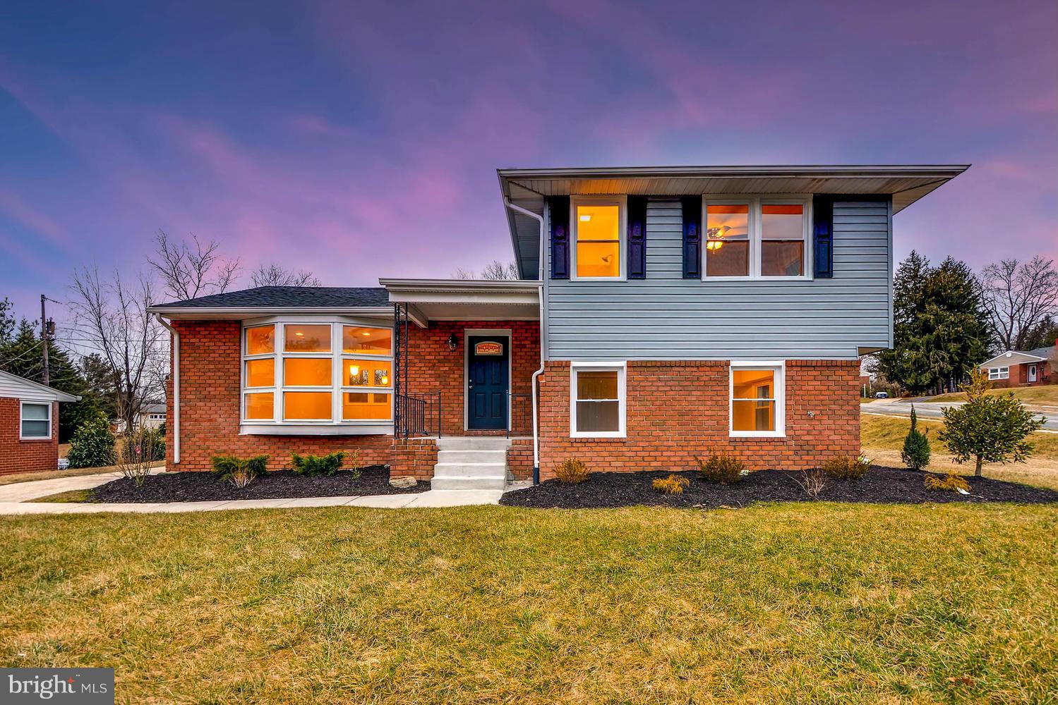 4515 Tapscott Road Pikesville, MD 21208 - Photo 1 of 28 a front view of a house with a yard