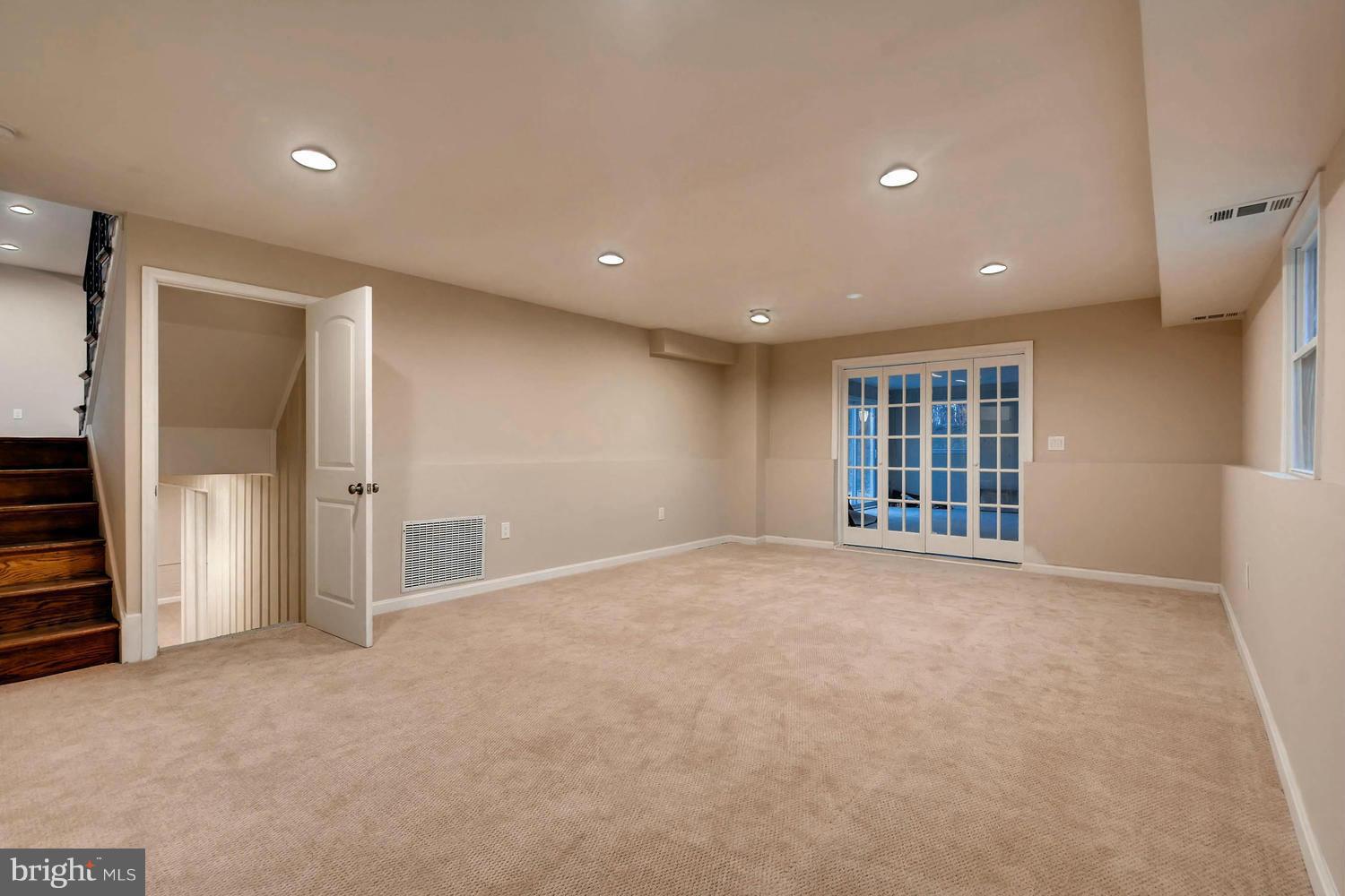 4515 Tapscott Road Pikesville, MD 21208 - Photo 20 of 28 a view of an empty room with a window