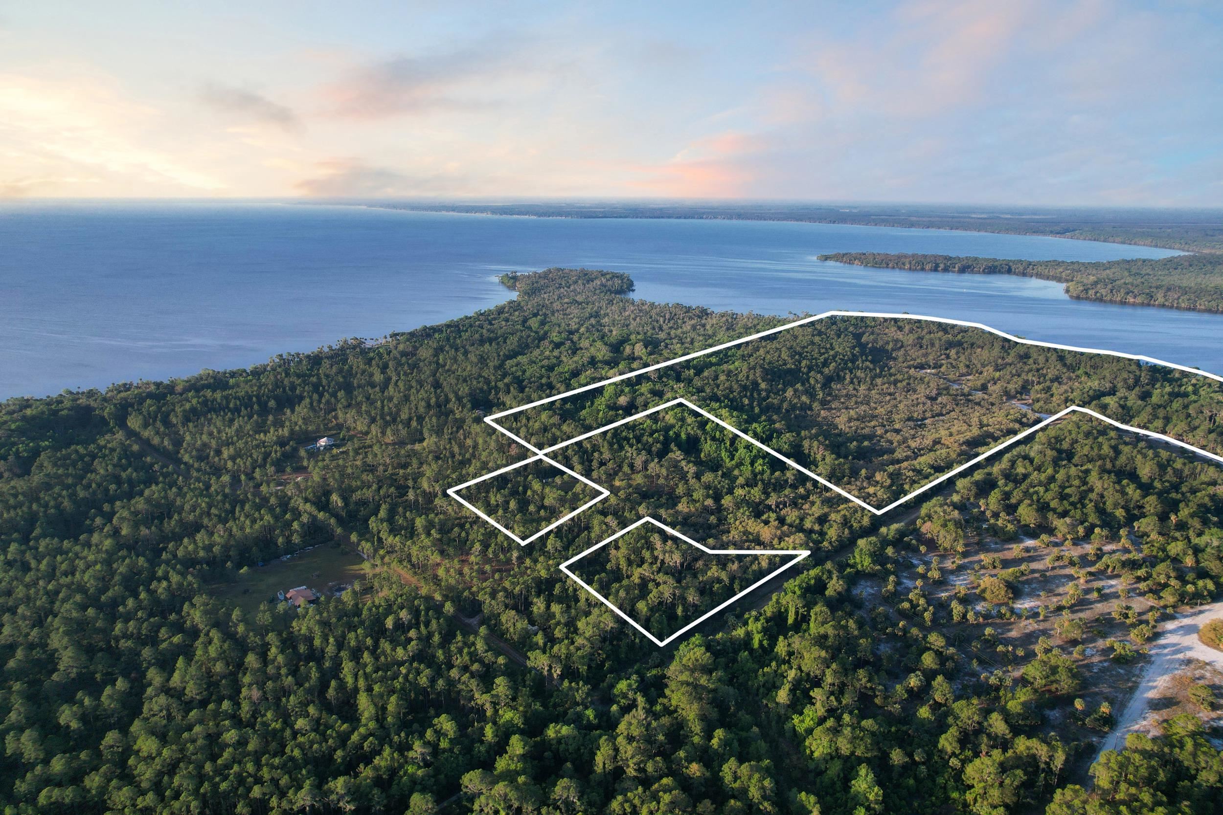 356 Drayton Island Road Georgetown, FL 32139 - Photo 4 of 41 a view of a tennis court