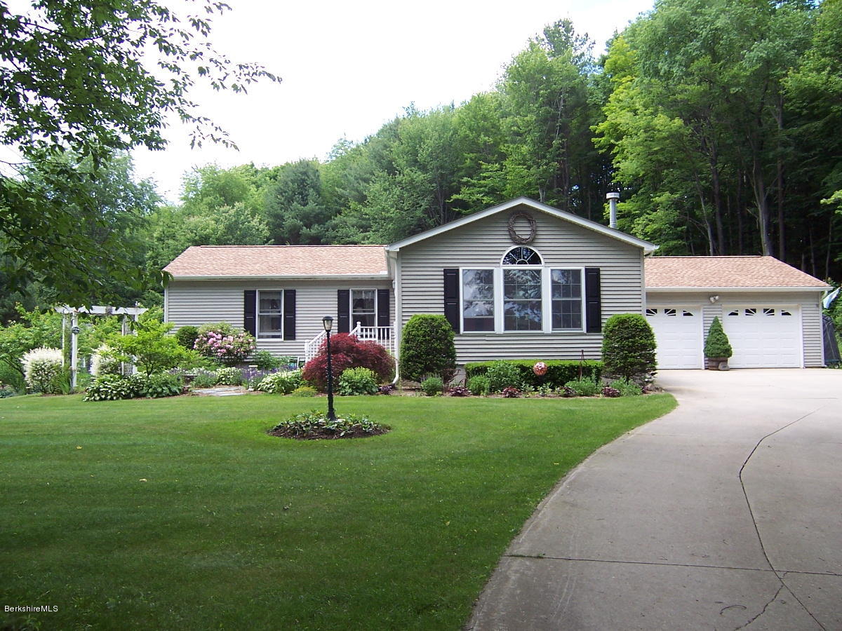 44 Stonehouse Road Washington, MA 01223 - Photo 1 of 56 a front view of a house with a yard