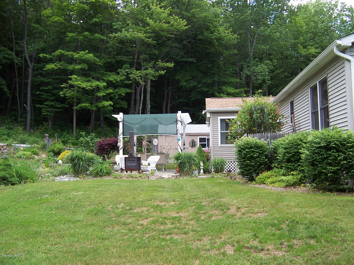 44 Stonehouse Road Washington, MA 01223 - Photo 15 of 56 a view of house with backyard outdoor seating and green space