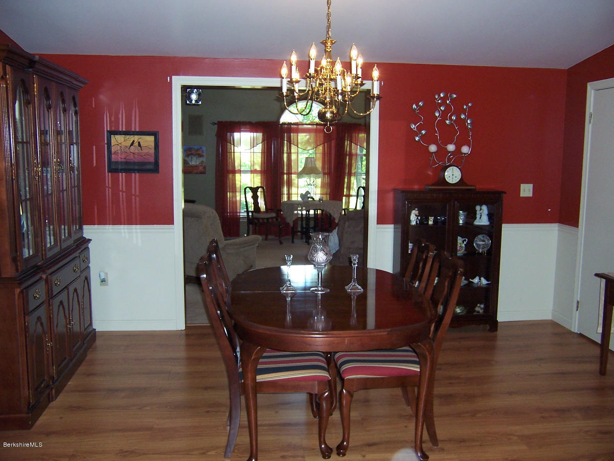 44 Stonehouse Road Washington, MA 01223 - Photo 33 of 56 a view of a dining room with furniture and chandelier