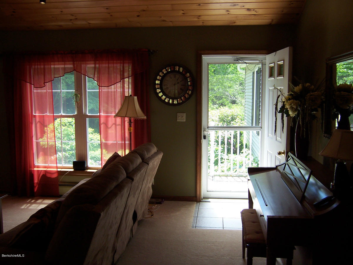 44 Stonehouse Road Washington, MA 01223 - Photo 35 of 56 a living room with furniture and a flat screen tv