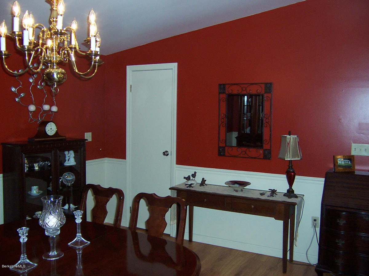44 Stonehouse Road Washington, MA 01223 - Photo 36 of 56 a view of dining room with furniture and chandelier