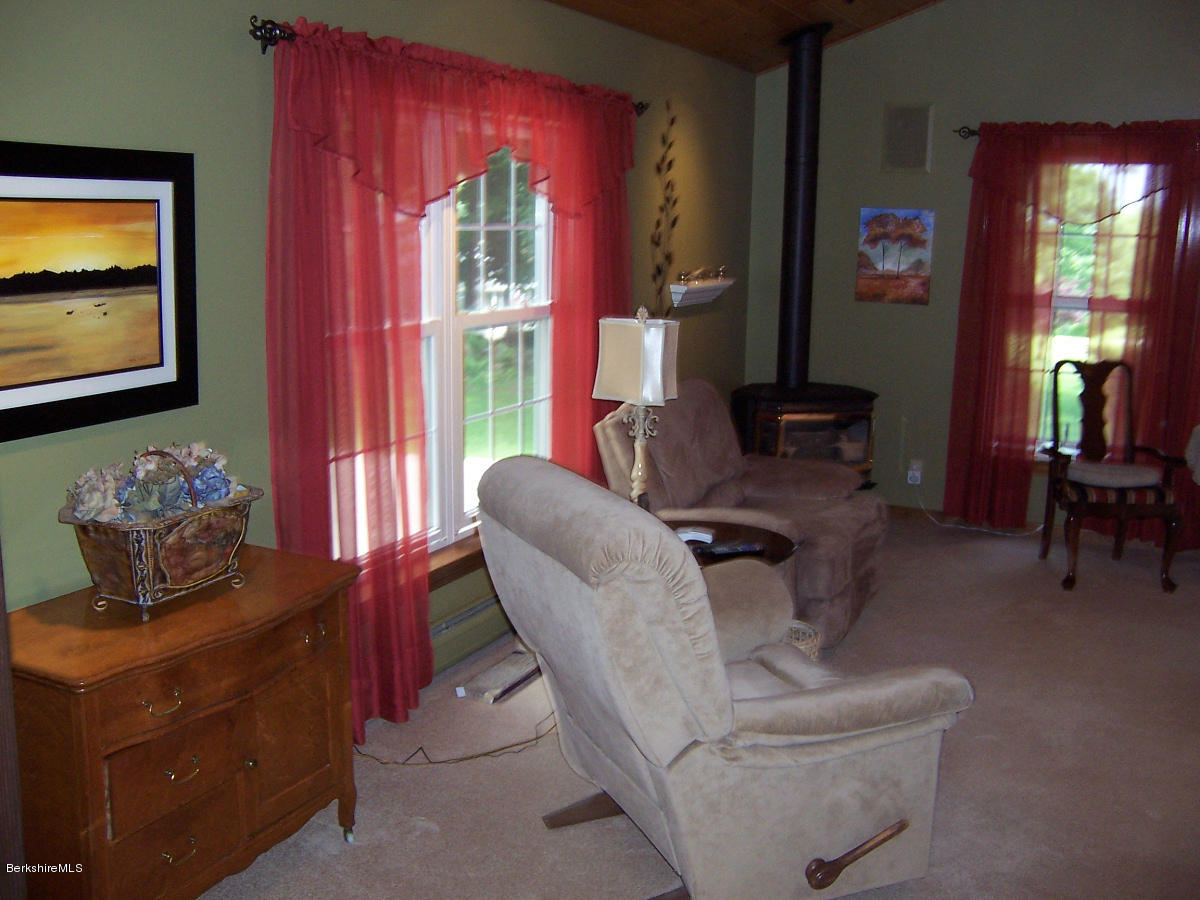 44 Stonehouse Road Washington, MA 01223 - Photo 38 of 56 a living room with furniture and a large window