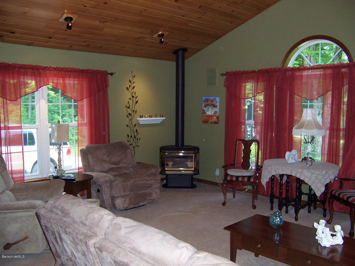 44 Stonehouse Road Washington, MA 01223 - Photo 39 of 56 a living room with furniture and a large window