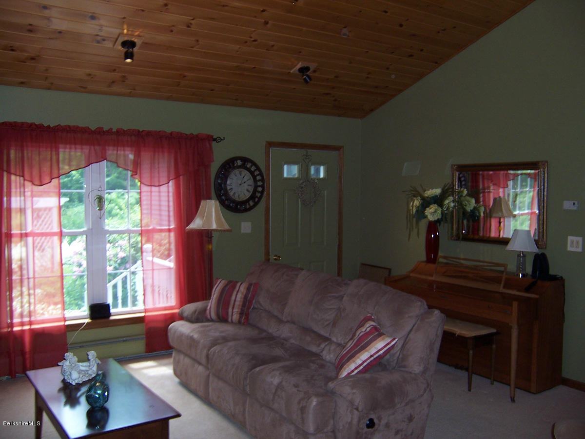 44 Stonehouse Road Washington, MA 01223 - Photo 41 of 56 a living room with furniture and a window