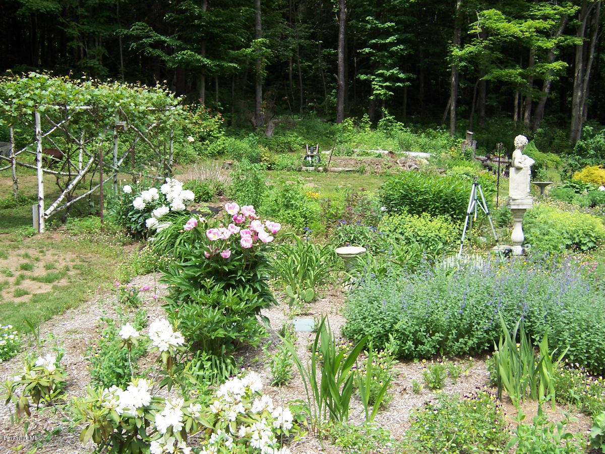44 Stonehouse Road Washington, MA 01223 - Photo 9 of 56 a view of garden with plants and a bench