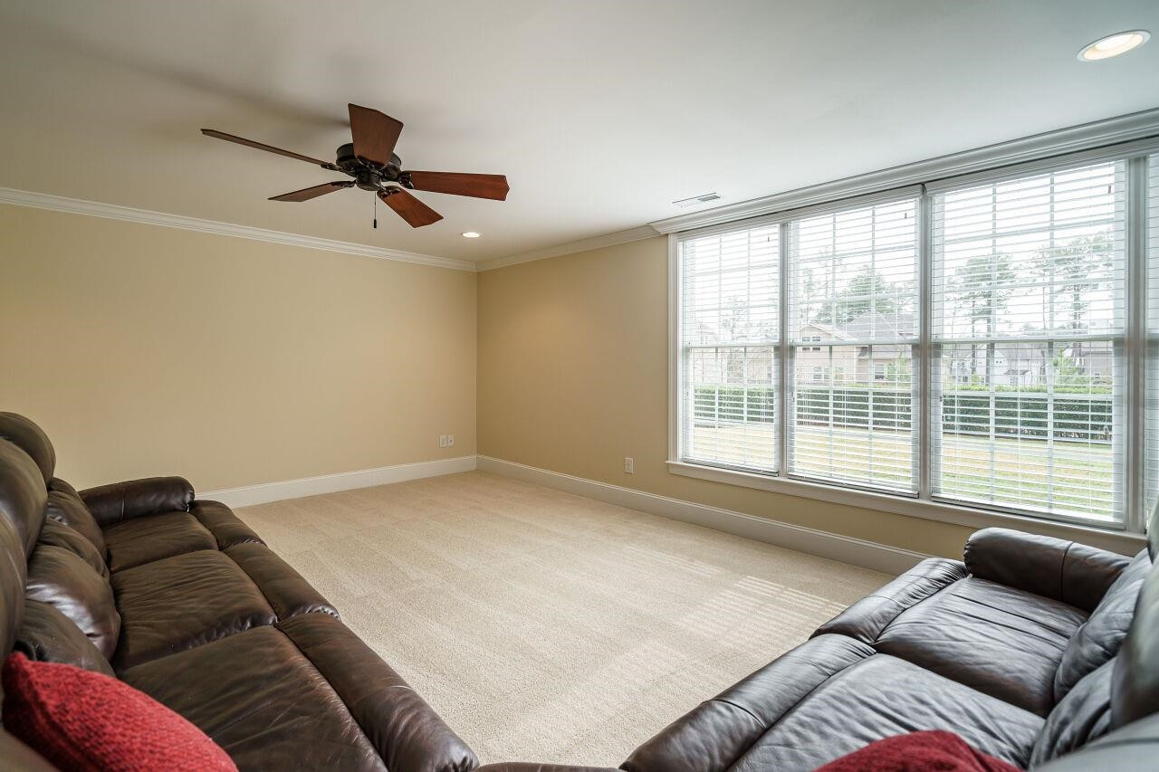 5327 Landguard Drive Raleigh, NC 27613 - Photo 42 of 45 Basement bonus area great for games! Walk out to the large backyard and continue the fun! Basement