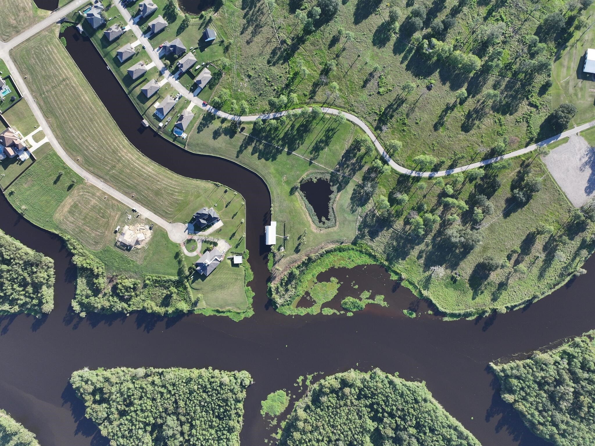 1315 Alice Lane Beaumont, TX 77705 - Photo 2 of 14 an aerial view of a residential house with a yard and green space