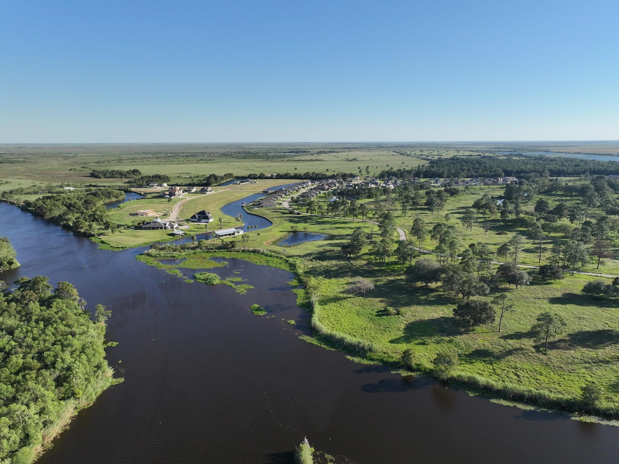 1315 Alice Lane Beaumont, TX 77705 - Photo 4 of 14 an aerial view of ocean with residential houses with outdoor space