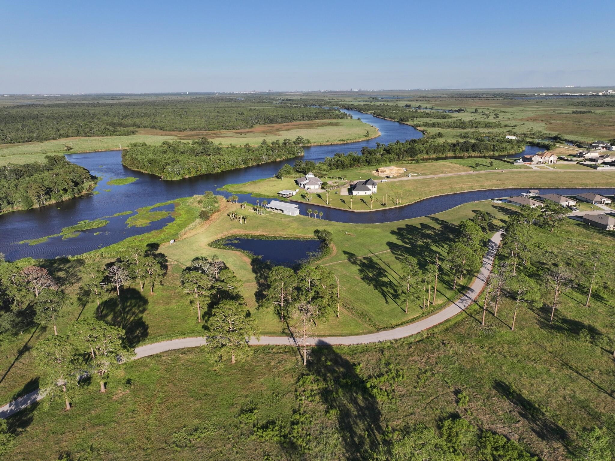 1315 Alice Lane Beaumont, TX 77705 - Photo 6 of 14 an aerial view of ocean with residential houses with outdoor space