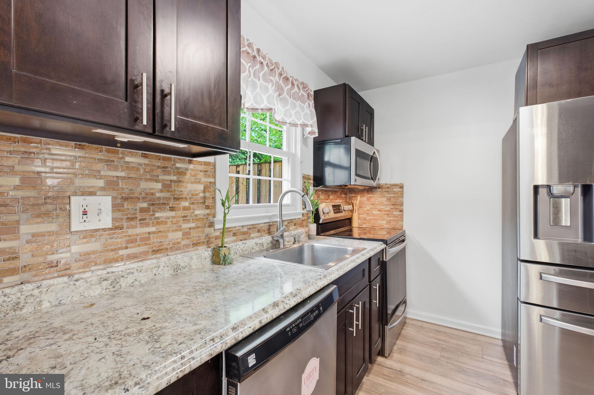 7709 Matisse Way Springfield, VA 22153 - Photo 13 of 27 Kitchen with window for natural light