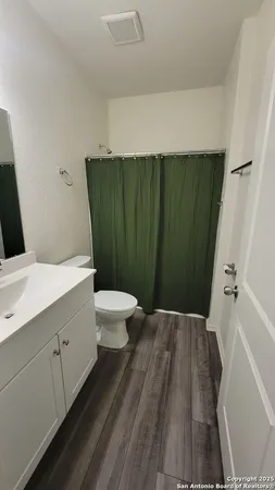 a bathroom with a sink and a toilet