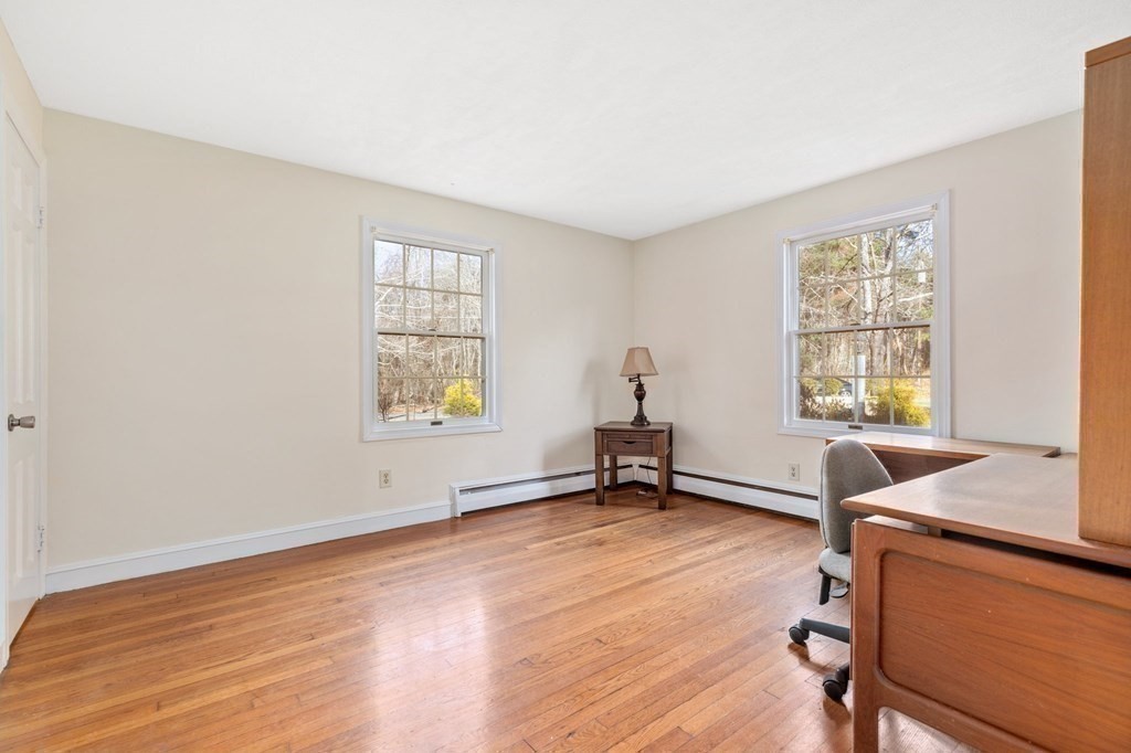 30 Woodside Road Topsfield, MA 01983 - Photo 21 of 42 a view of room with a window and wooden floor