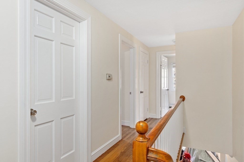 30 Woodside Road Topsfield, MA 01983 - Photo 24 of 42 a view of a hallway with chairs