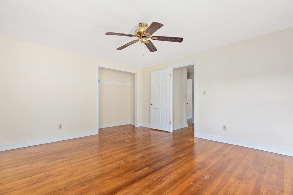 30 Woodside Road Topsfield, MA 01983 - Photo 33 of 42 a view of an empty room with wooden floor