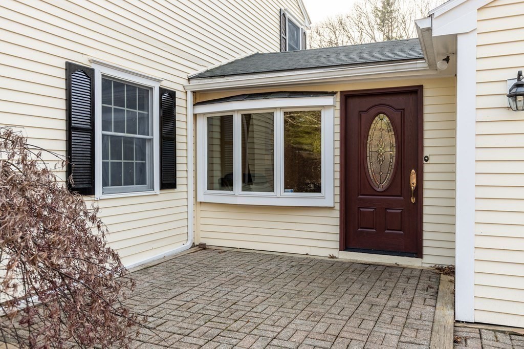 30 Woodside Road Topsfield, MA 01983 - Photo 35 of 42 a view of a door of a house with a window