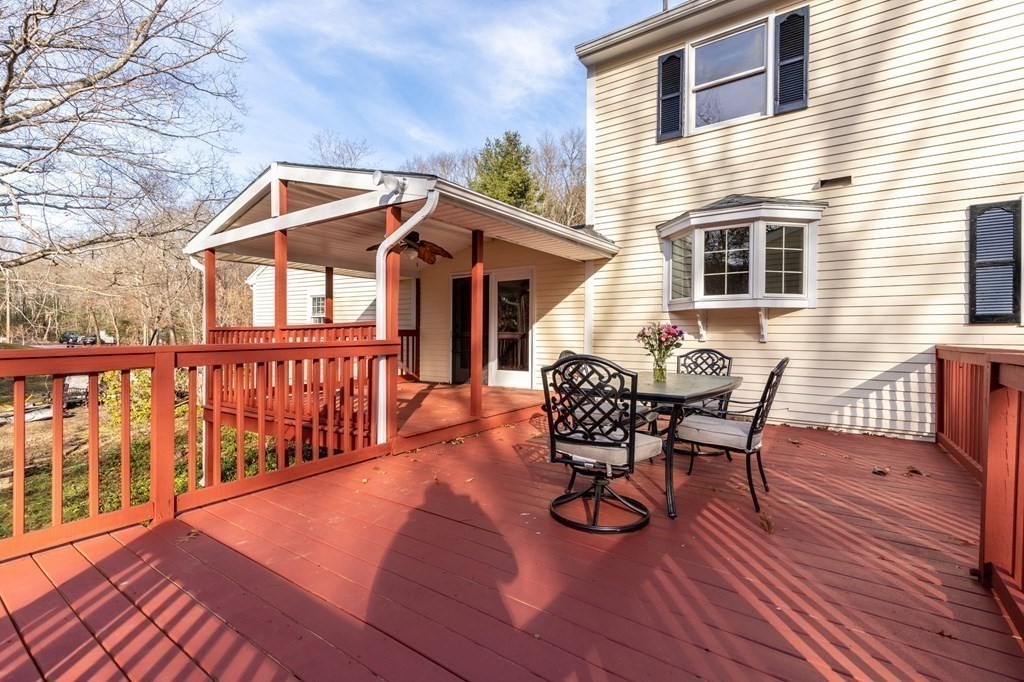 30 Woodside Road Topsfield, MA 01983 - Photo 39 of 42 a view of a house with backyard and sitting area