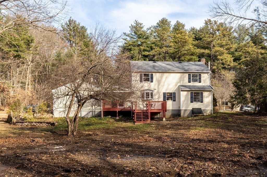 30 Woodside Road Topsfield, MA 01983 - Photo 41 of 42 a view of a house with a yard