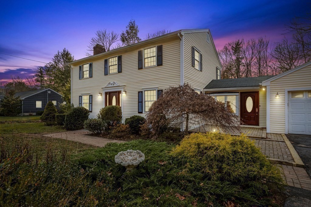 30 Woodside Road Topsfield, MA 01983 - Photo 42 of 42 a front view of a house with garden
