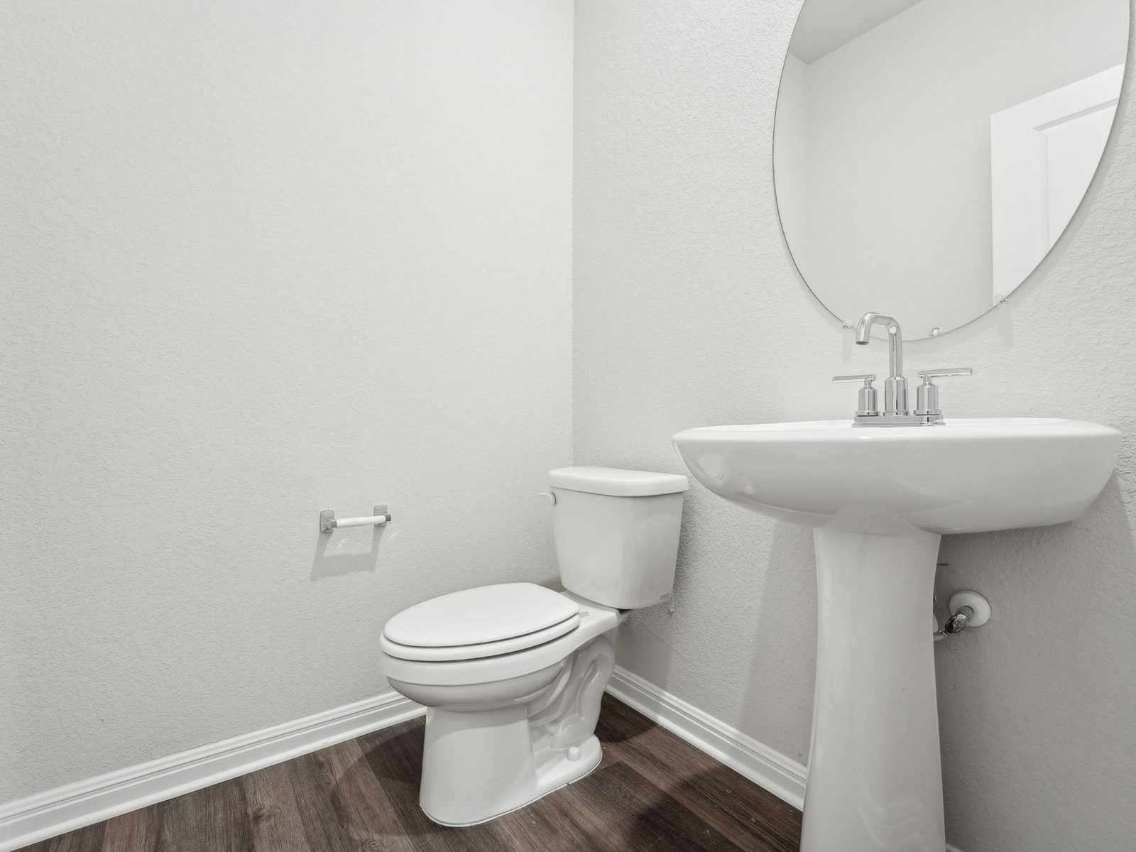 165 Calcite Road, Unit 2 Kyle, TX 78640 - Photo 8 of 17 a bathroom with a sink toilet and a mirror