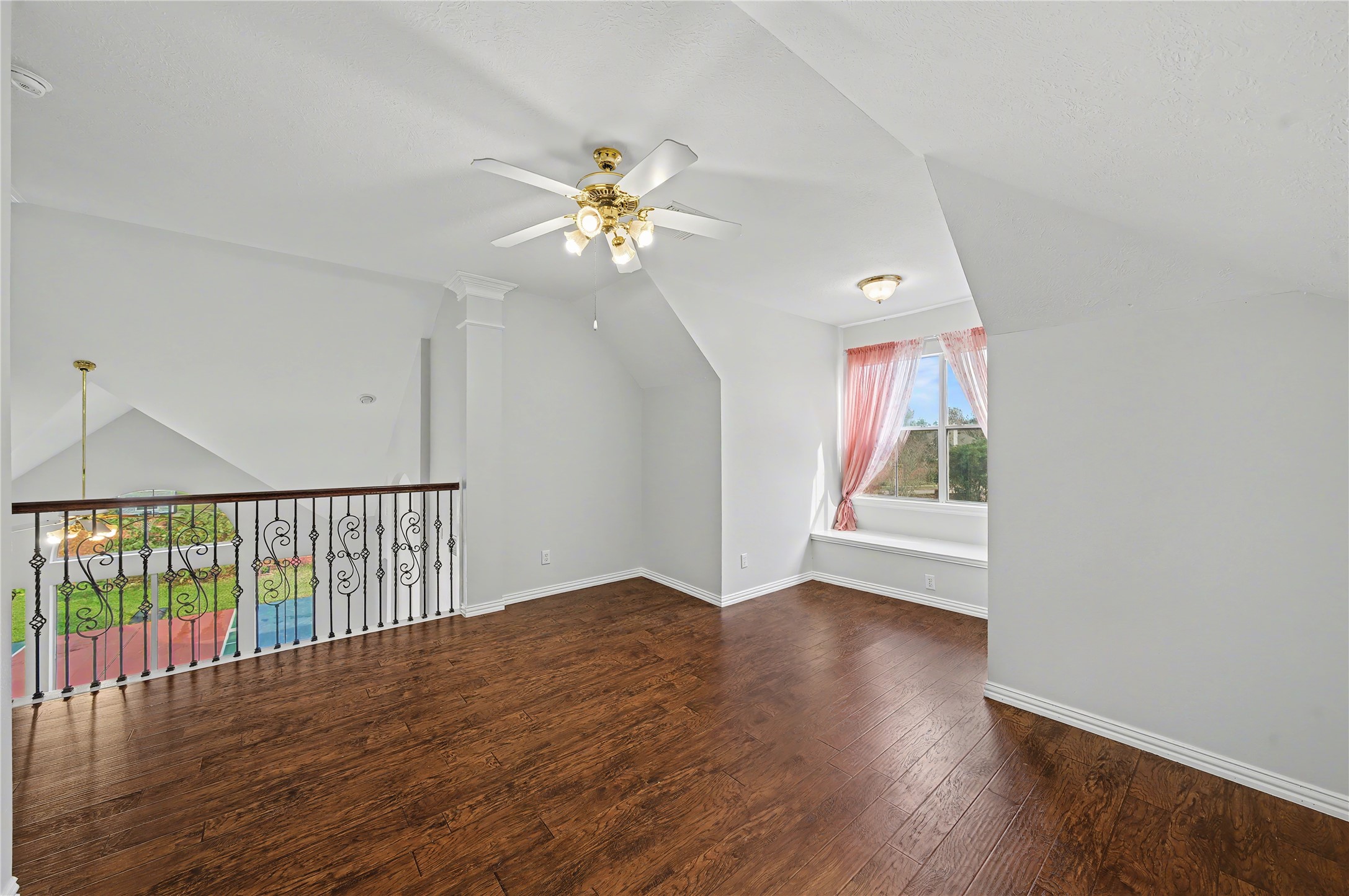 5403 Emerald Pointe Lane Sugar Land, TX 77479 - Photo 46 of 50 a view of empty room with wooden floor and fan