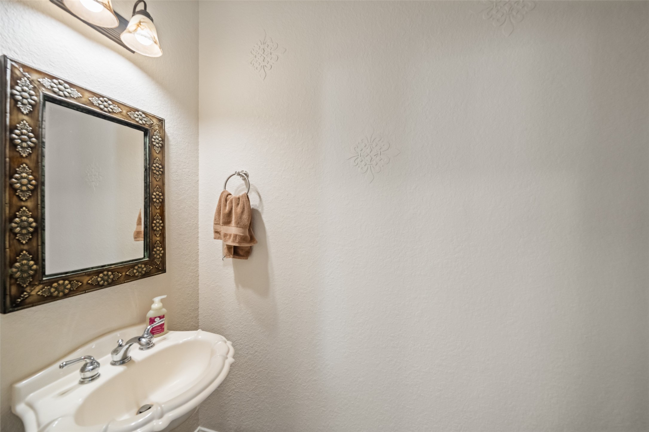 6010 Foxland Court Spring, TX 77379 - Photo 19 of 43 Half bathroom downstairs for the guests.