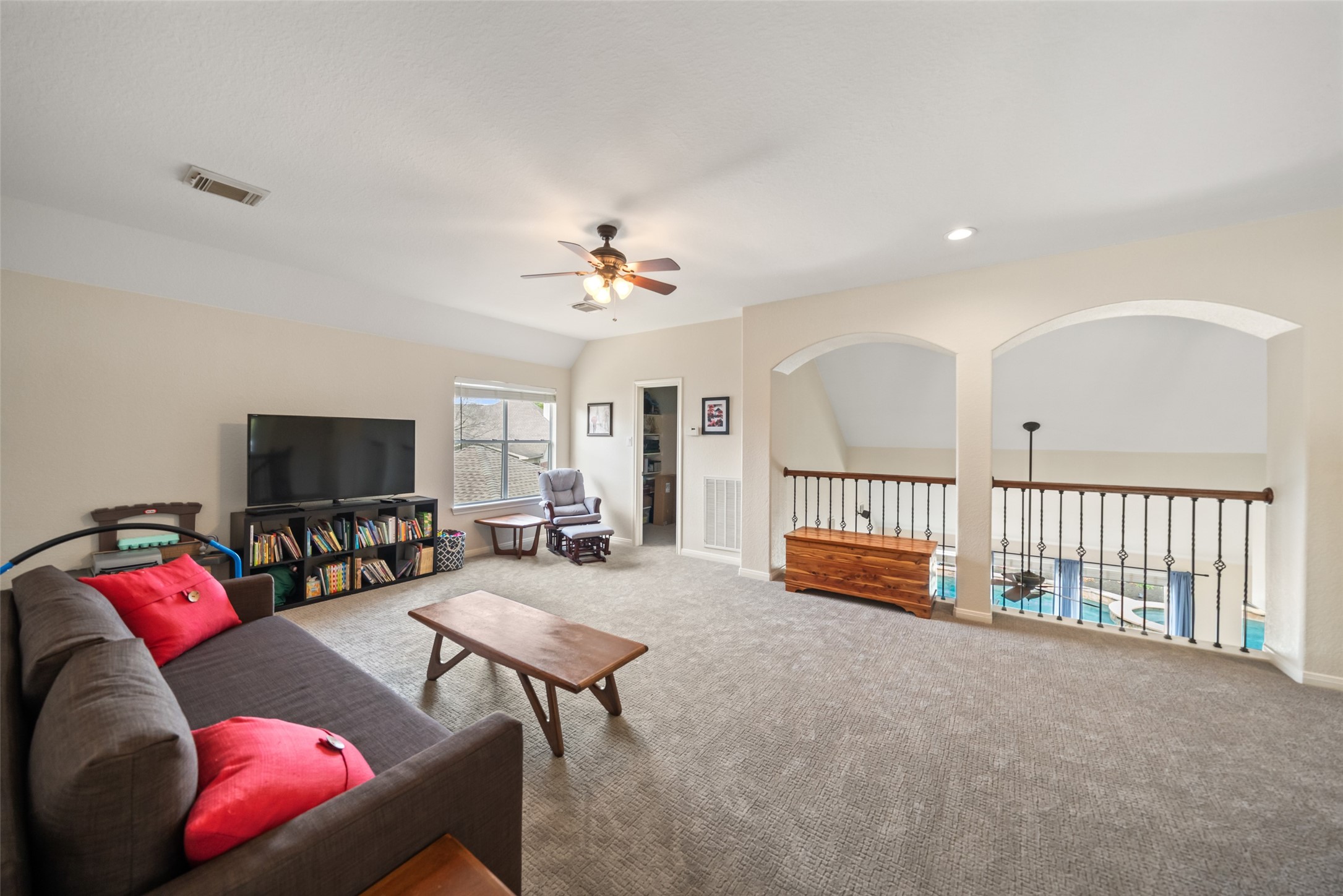 6010 Foxland Court Spring, TX 77379 - Photo 22 of 43 Game room upstairs is light and bright.